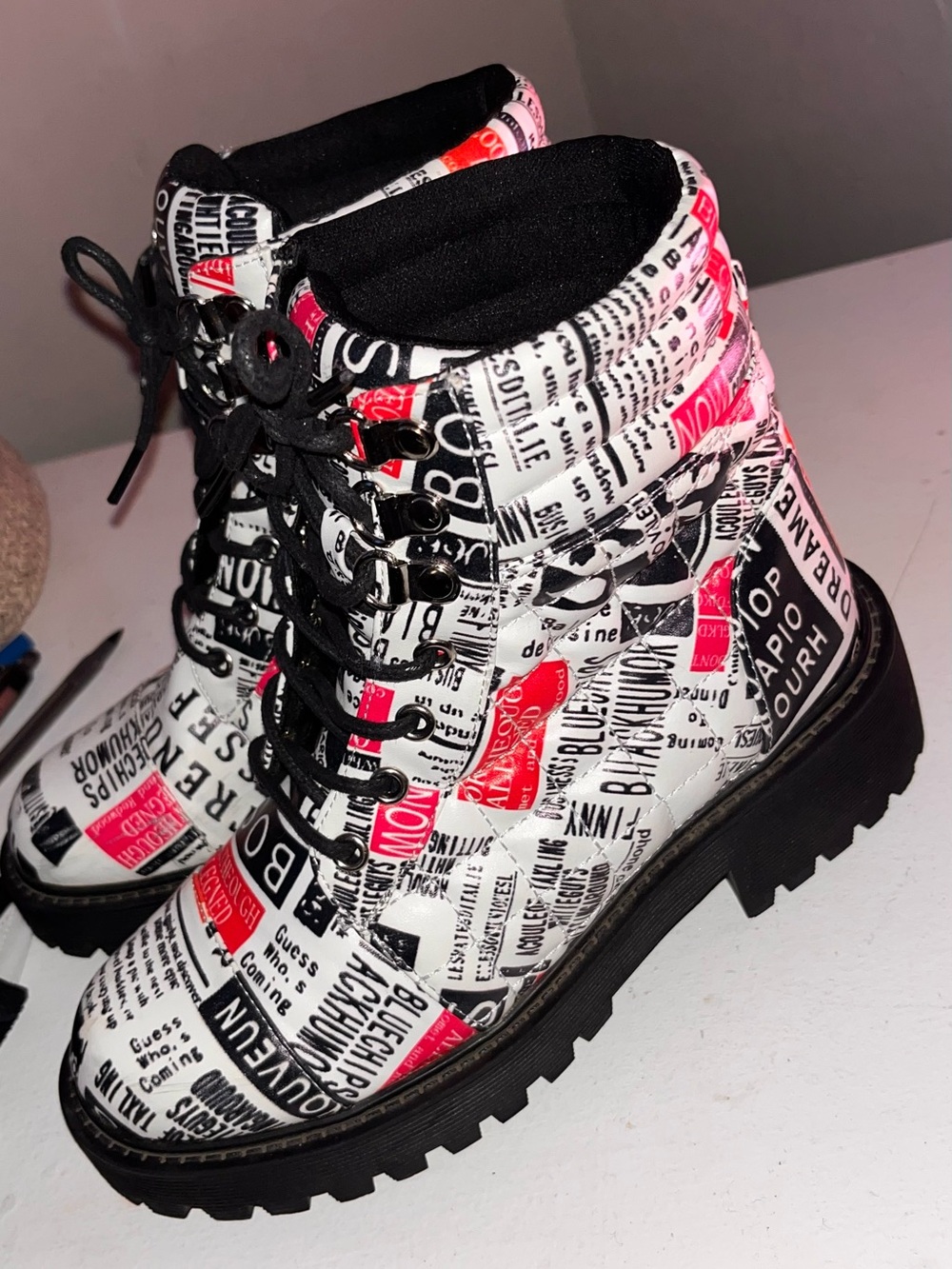 Graphic Lace-Up Combat Boots with newspaper print